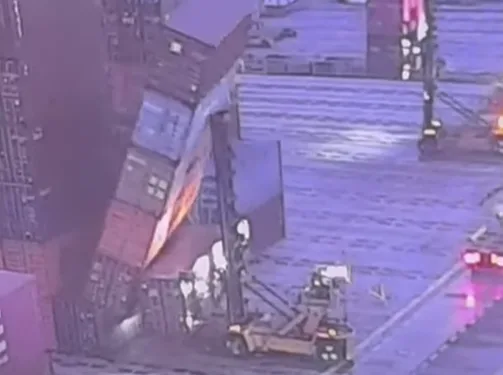Container handling in Singapore yard paused after boxes fall on forklift