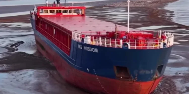 Ship stuck in England waits for April spring tide to move