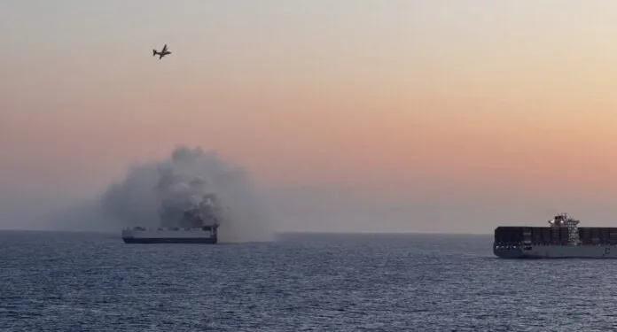 Fire-ravaged Morning Midas sinks under tow