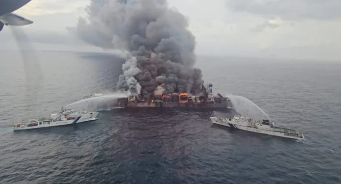 Salvors work on Wan Hai ship amid fears of more blasts