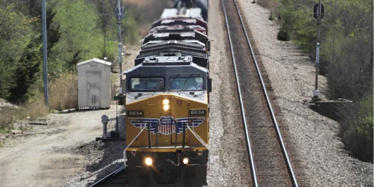 Competing railroads claim UP-NS merger application omits key information